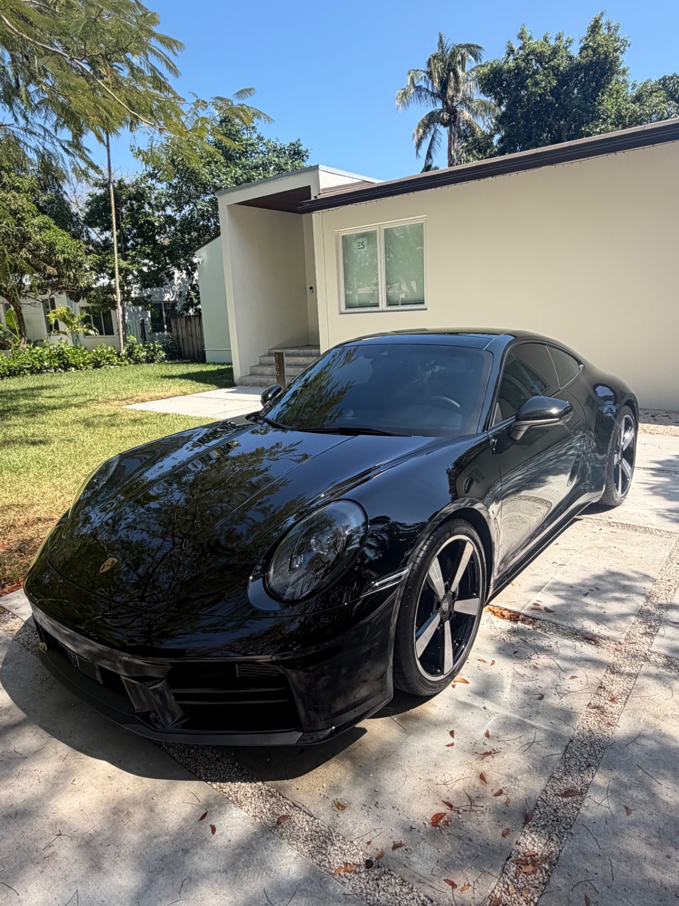 Glossy black Porsche 911 detailed by BLU'S