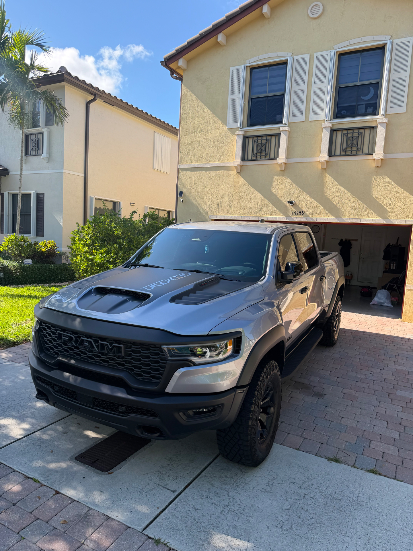 Silver Ram TRX freshly detailed in a Florida driveway